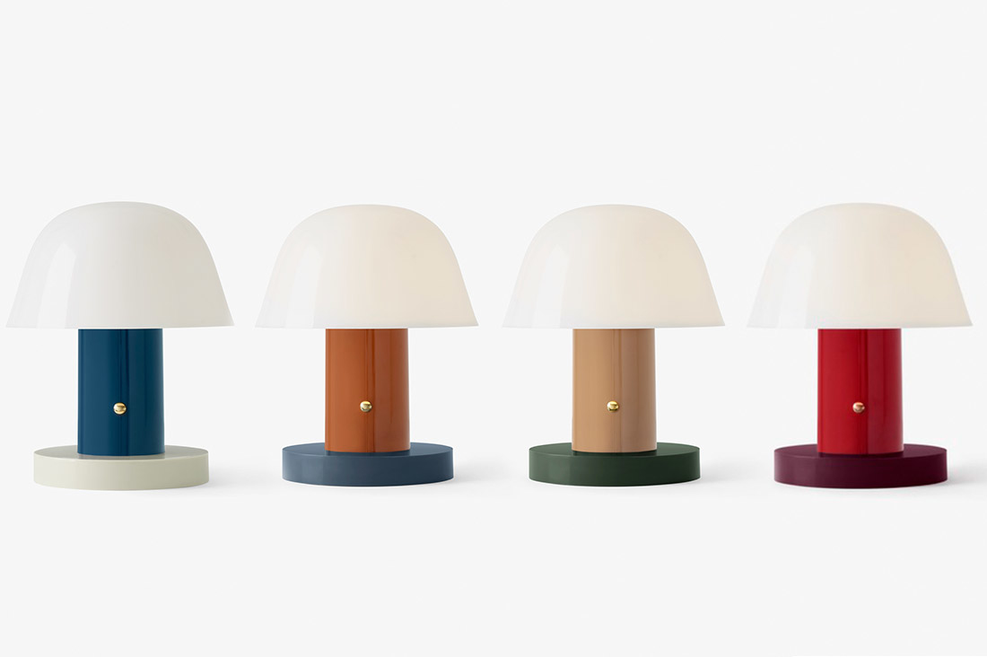 vier design lampen op een rij in alle kleuren van Andtradition