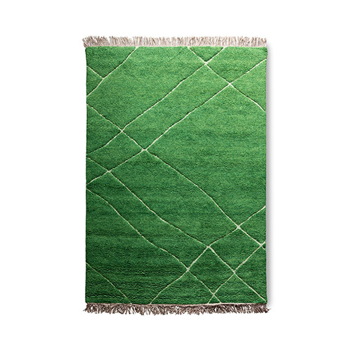 Hand gemaakt vloerkleed in de kleur groen, voeg wat design aan je huis toe met HKliving. 